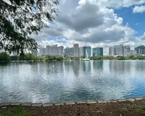 Orlando skyline across Lake Eola with the fountain in view